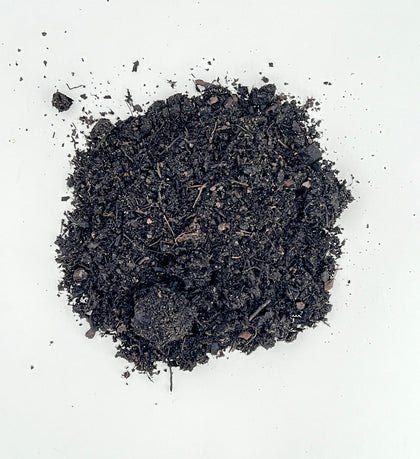 Bulk topsoil and compost pile at Peach Country Tractor